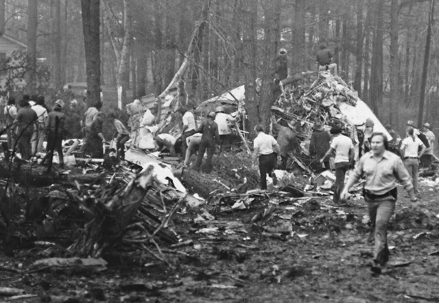 First Responders looking for survivors after the crash of Southern Airways Flight 242