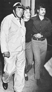 Ron Crysler (on rt.) walking into Kennestone Hospital with Cathleen Keele