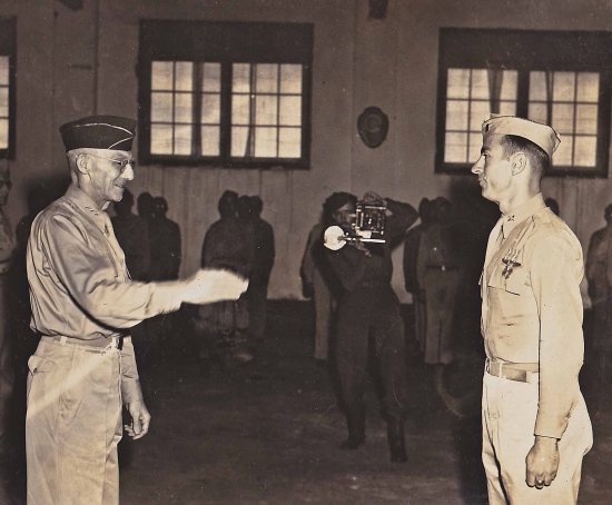 Capt. C. James Crysler receiving the Distinguished Flying Cross from Gen. Joseph Stilwell