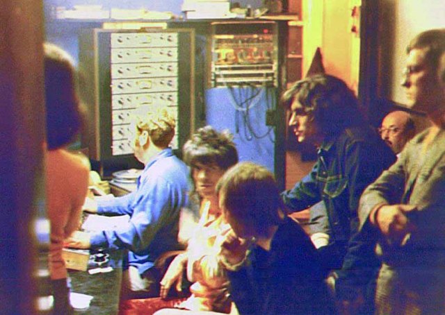 (L-R) Bill Wyman, Jimmy Johnson, Keith Richards, Charlie Watts, unknown crew member, Ahmet Ertegun (president of Atlantic Records), and Terry Woodford at the Muscle Shoals Sound Studio in Sheffield, Alabama. The Rolling Stones recorded Brown Sugar, Wild Horses, and You Gotta Move at MSSS from December 2-4, 1969.